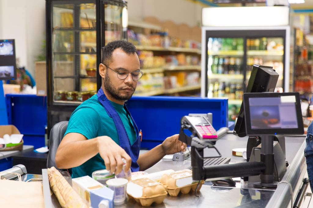 focused-african-american-cashier-scanning-goods-checkout-1024x683 focused-african-american-cashier-scanning-goods-checkout-1024x683 technology in retail technology Technology in retail, to revolutionize the retail world focused african american cashier scanning goods checkout 1024x683